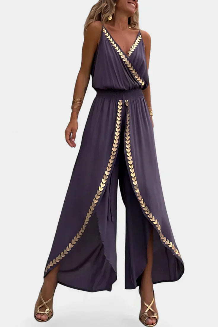 Donatila | Jumpsuit med gulddetaljer og åbent ben