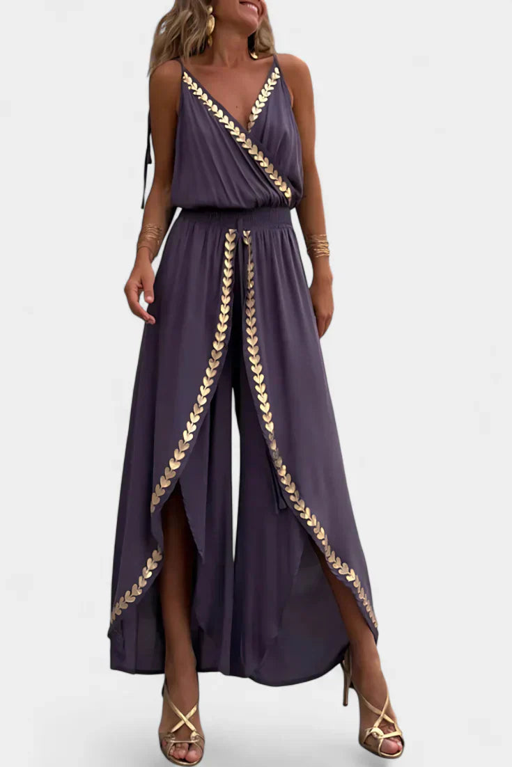 Donatila | Jumpsuit med gulddetaljer og åbent ben