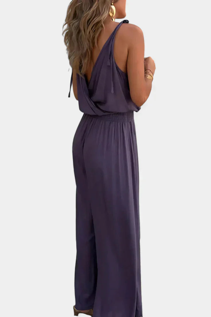 Donatila | Jumpsuit med gulddetaljer og åbent ben