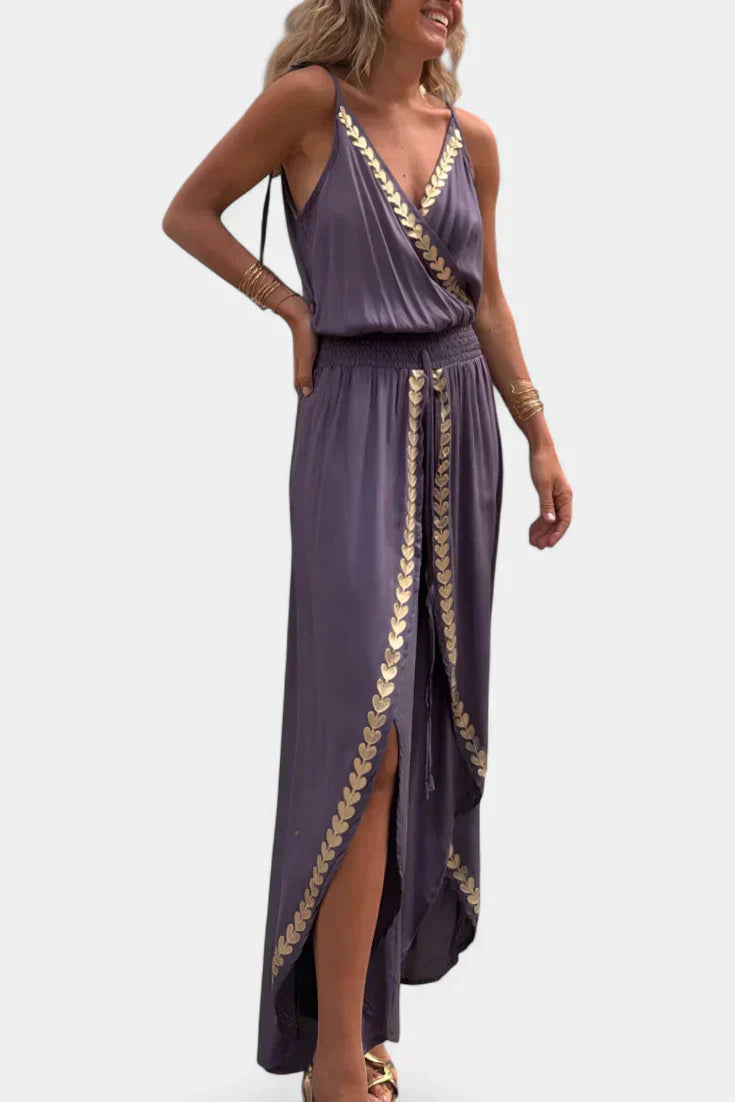 Donatila | Jumpsuit med gulddetaljer og åbent ben