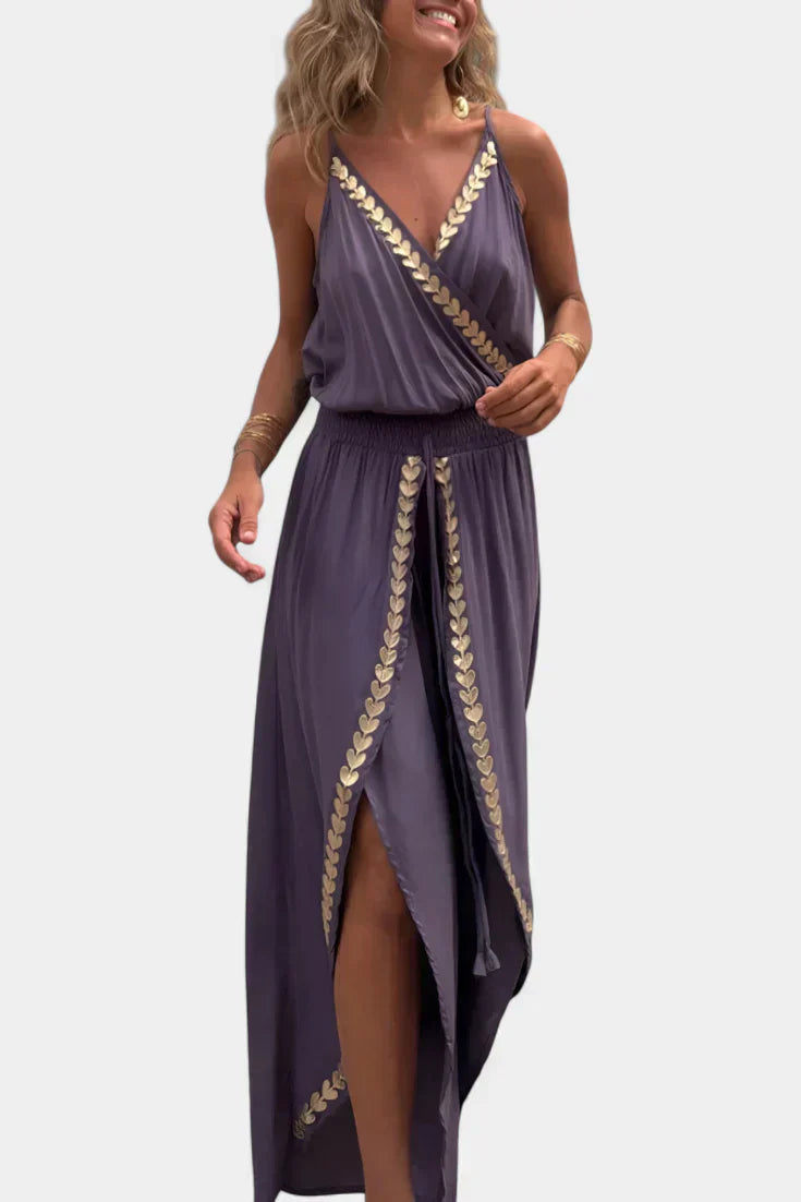 Donatila | Jumpsuit med gulddetaljer og åbent ben