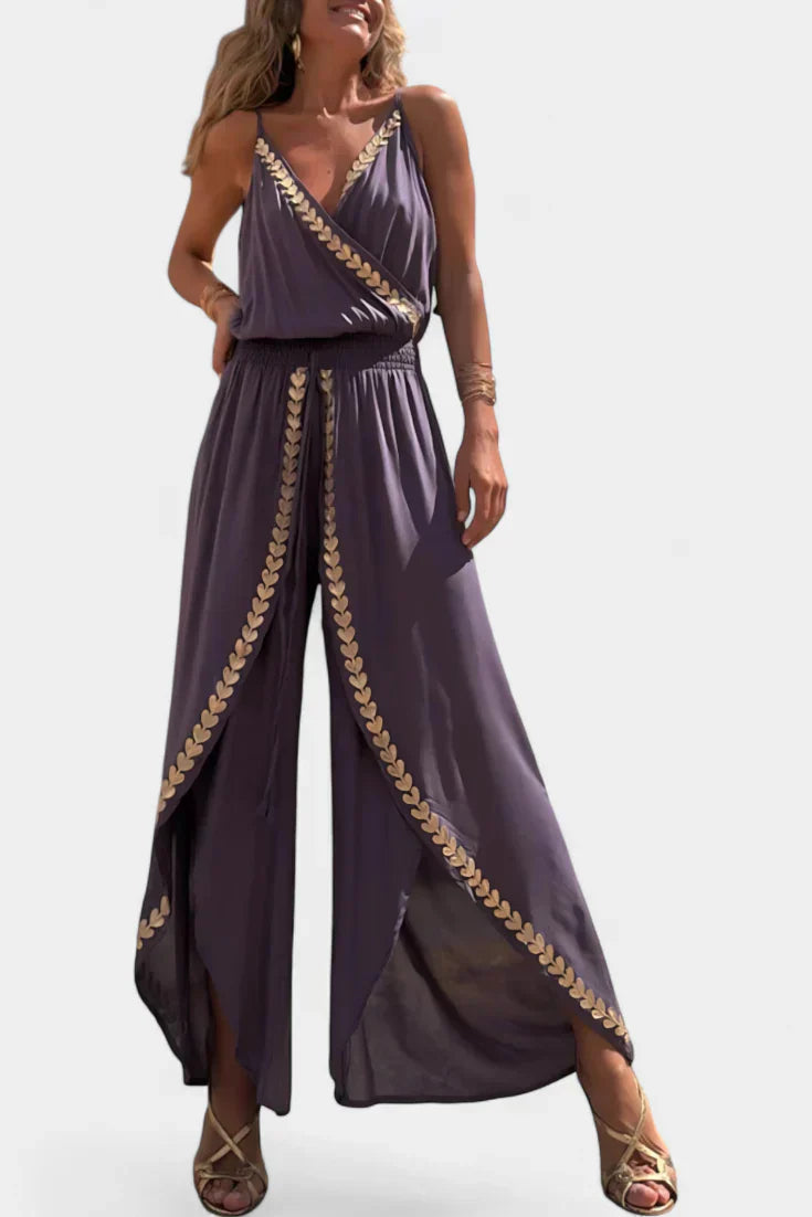 Donatila | Jumpsuit med gulddetaljer og åbent ben