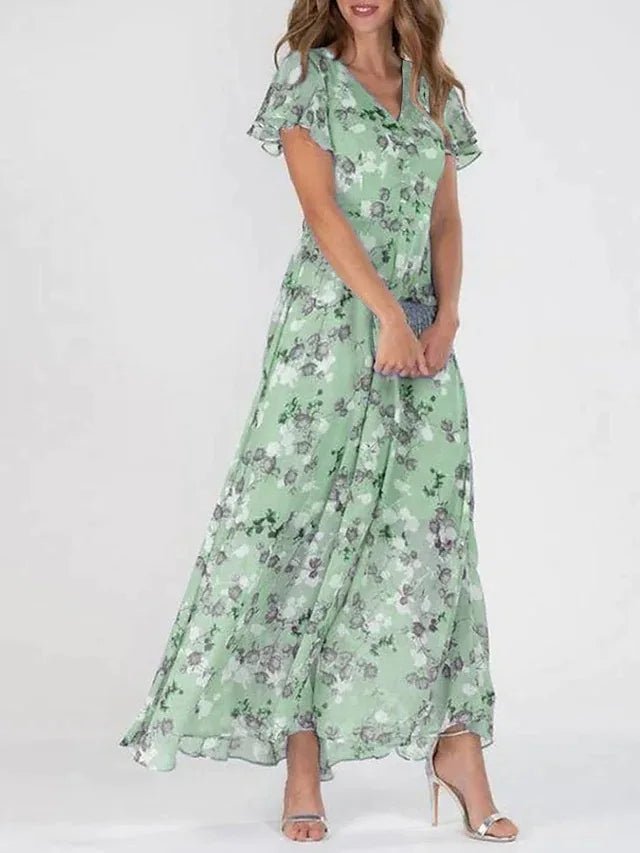 Zonia — Lang, bølgende kjole med blomsterprint