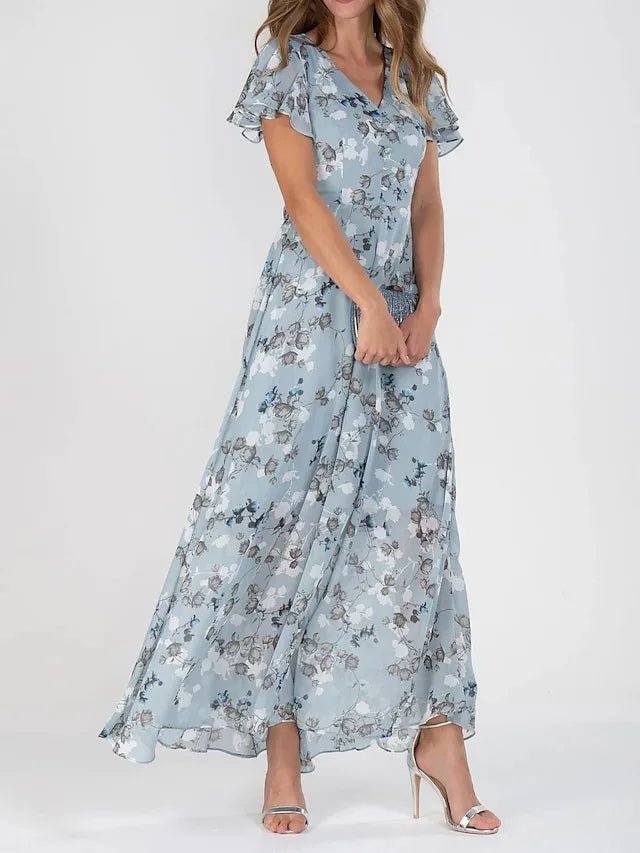 Zonia — Lang, bølgende kjole med blomsterprint