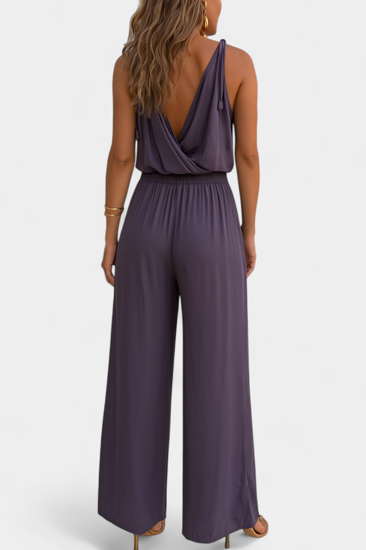Donatila | Jumpsuit med gulddetaljer og åbent ben