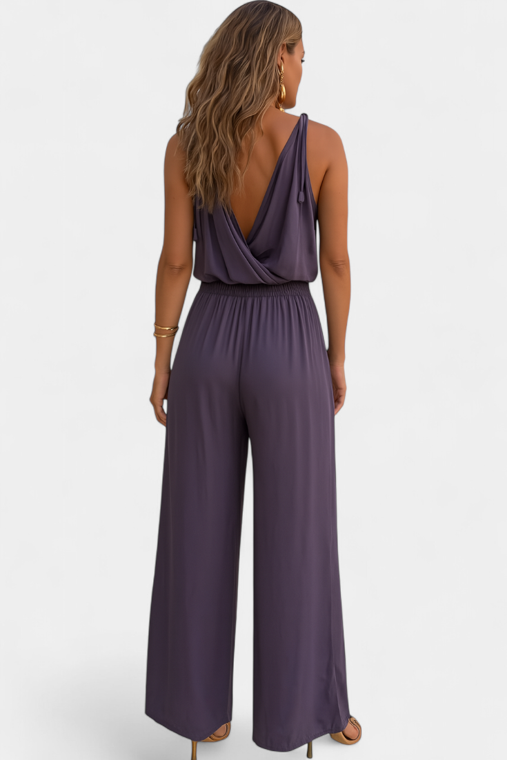 Donatila | Jumpsuit med gulddetaljer og åbent ben