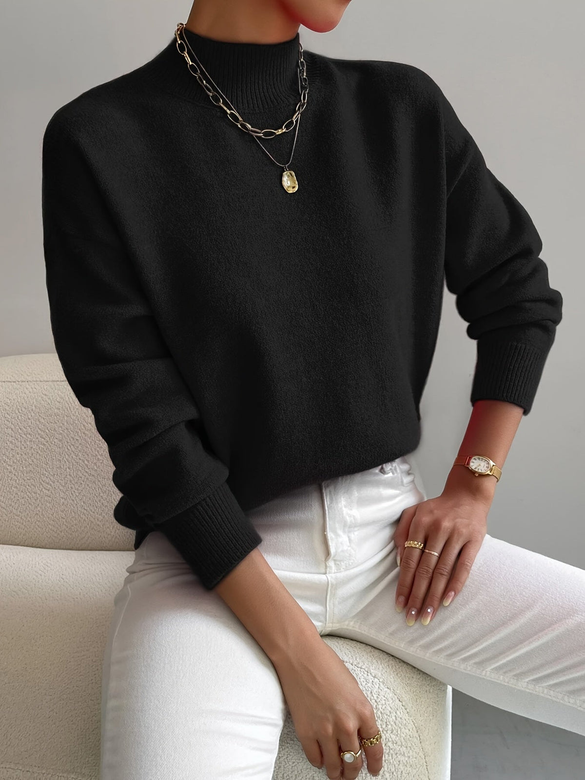 Silvana | Elegant strikket rullekravesweater med slå-om-effekt