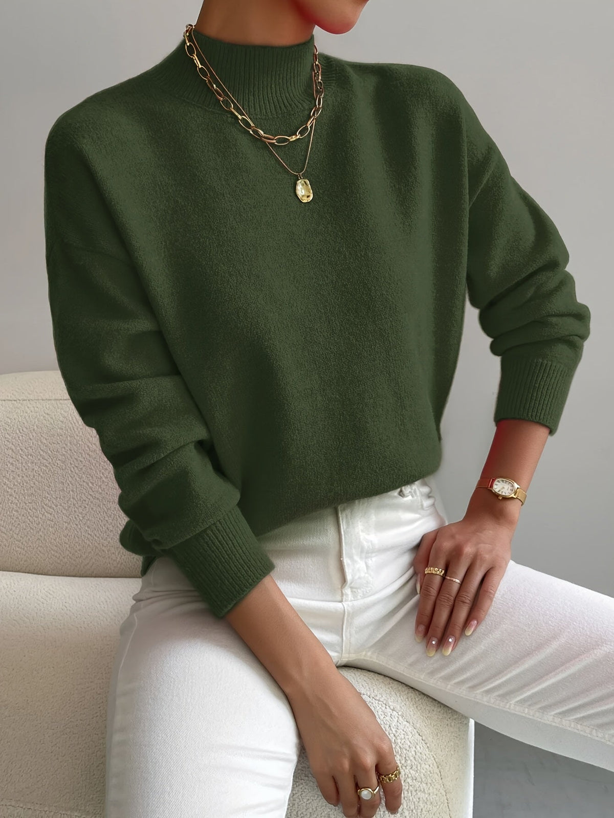 Silvana | Elegant strikket rullekravesweater med slå-om-effekt