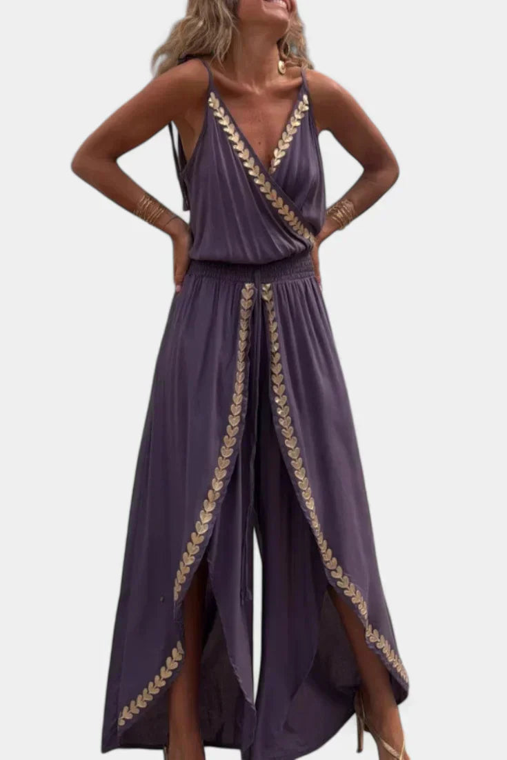 Donatila | Jumpsuit med gulddetaljer og åbent ben