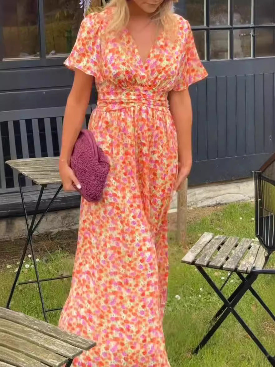 Elis — Lang og luftig kjole med blomsterprint