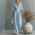 Elowen – Elegant draperet jumpsuit med vide ben