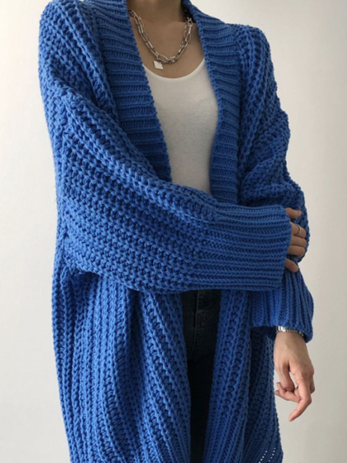 Carmela – Oversized strikcardigan med slæds