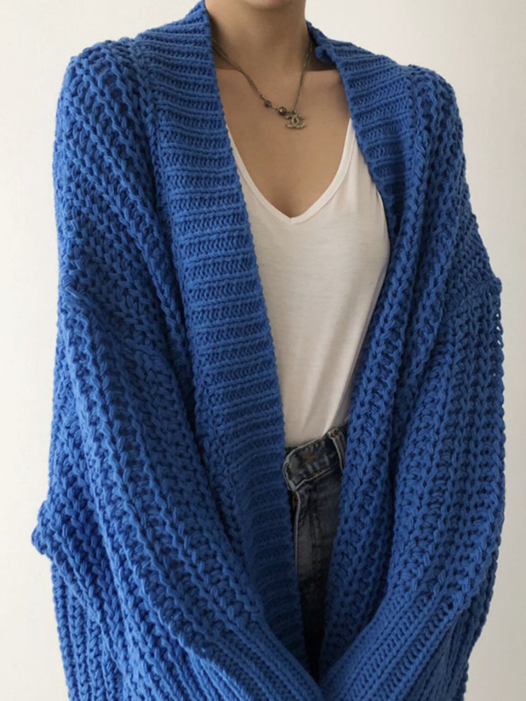 Carmela – Oversized strikcardigan med slæds