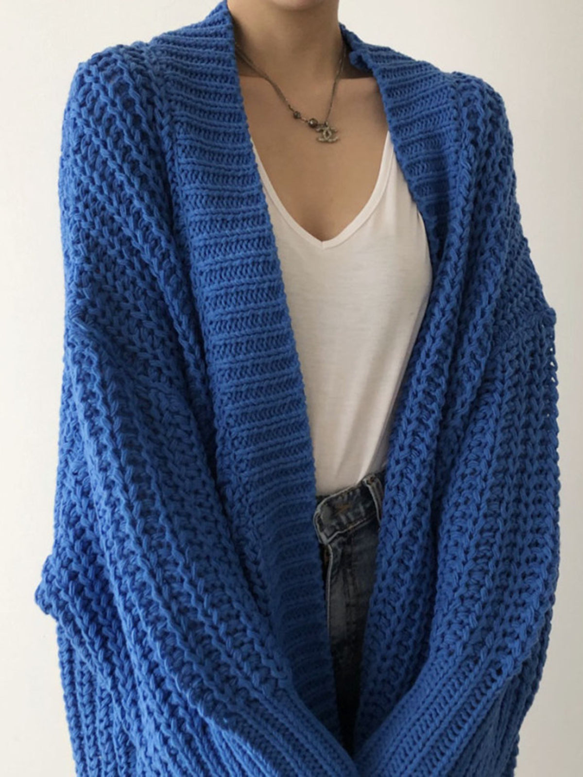 Carmela – Oversized strikcardigan med slæds