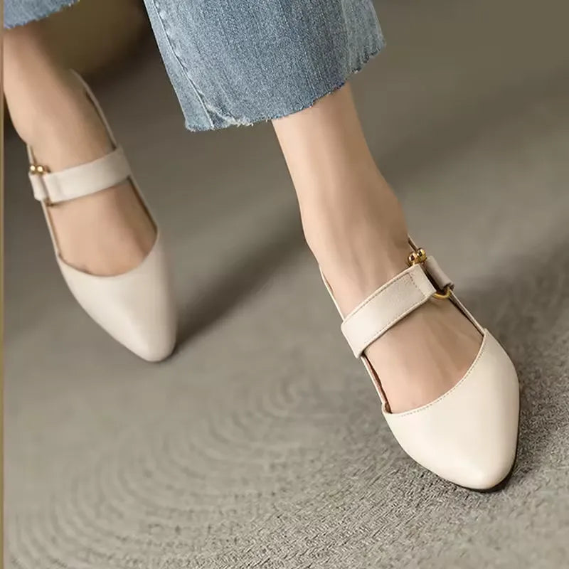Loretta – Slingback-pumps med skulpturel hæl