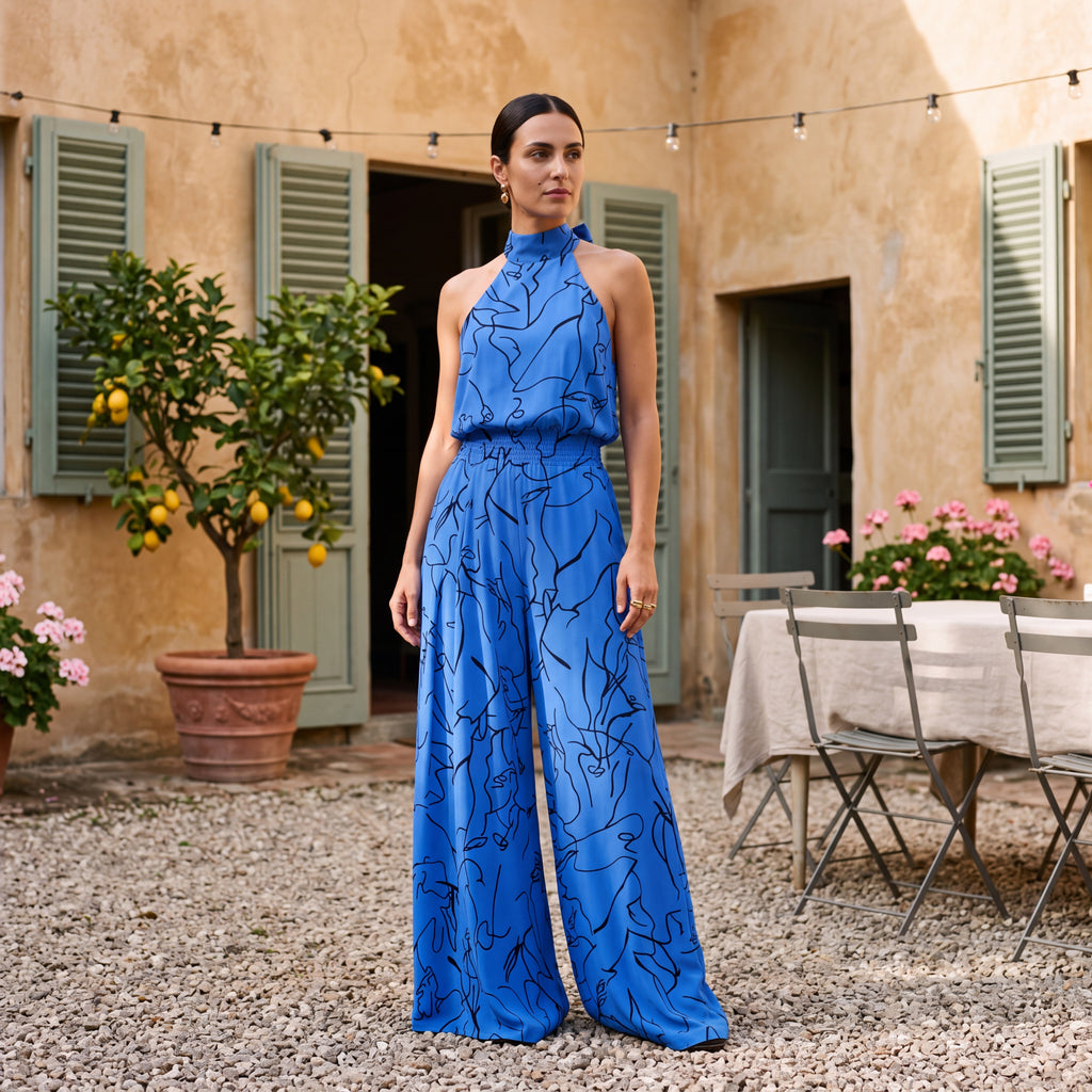 Ginevra – Jumpsuit med halterneck og palazzobukser