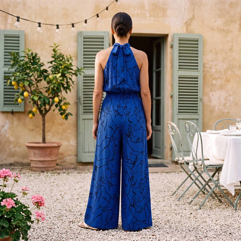 Ginevra – Jumpsuit med halterneck og palazzobukser