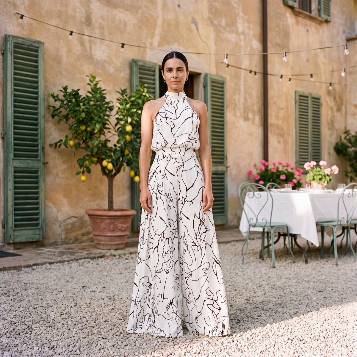 Ginevra – Jumpsuit med halterneck og palazzobukser