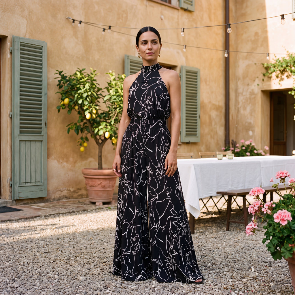 Ginevra – Jumpsuit med halterneck og palazzobukser