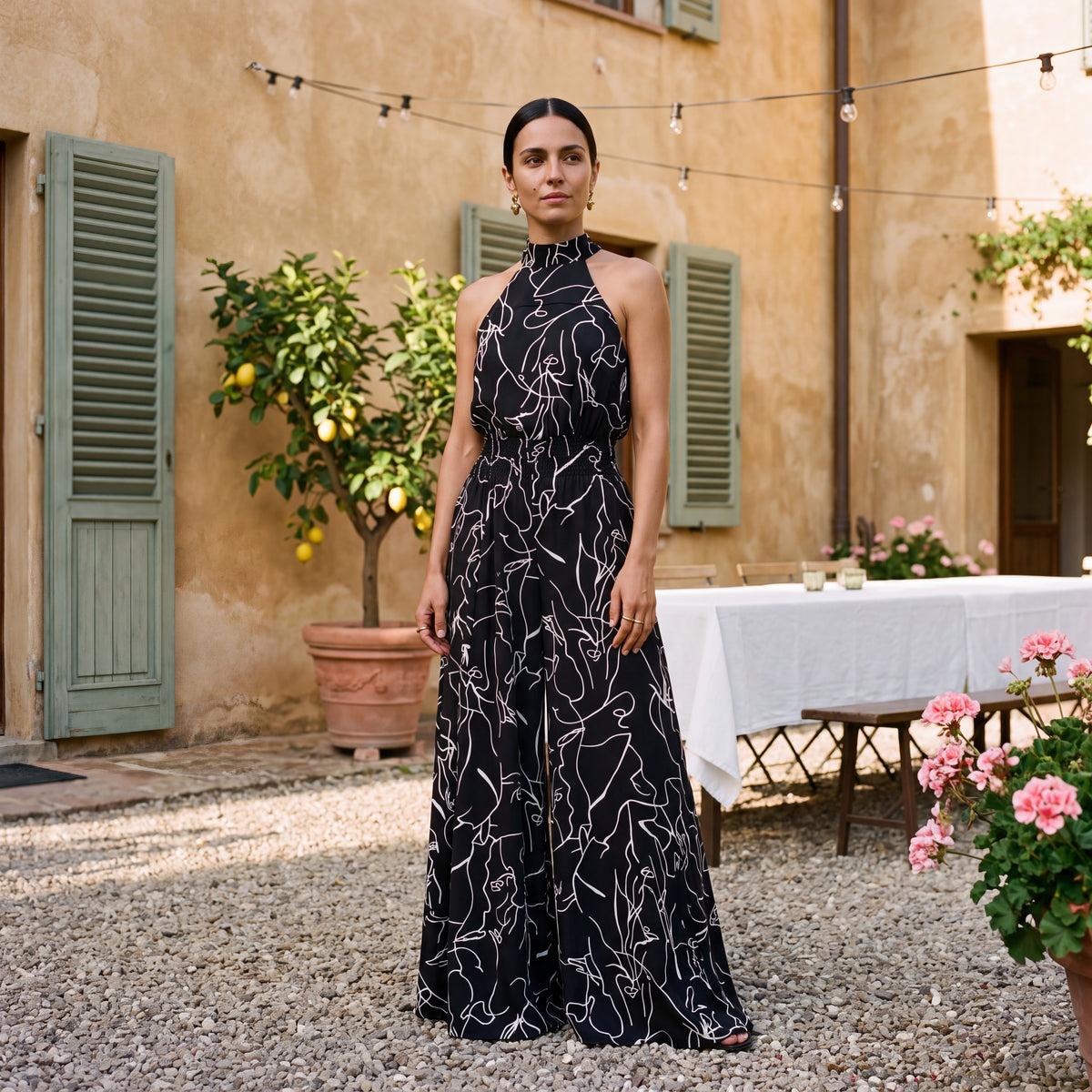 Ginevra – Jumpsuit med halterneck og palazzobukser