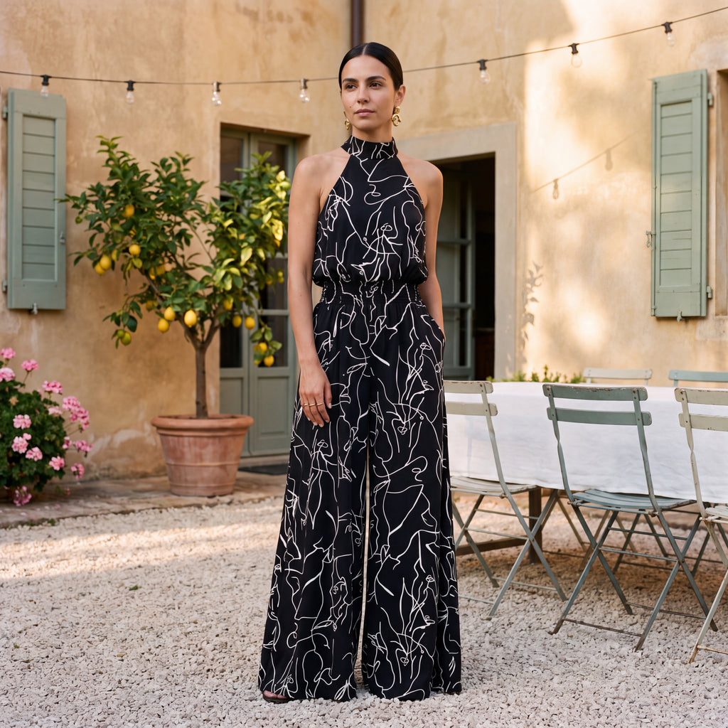 Ginevra – Jumpsuit med halterneck og palazzobukser