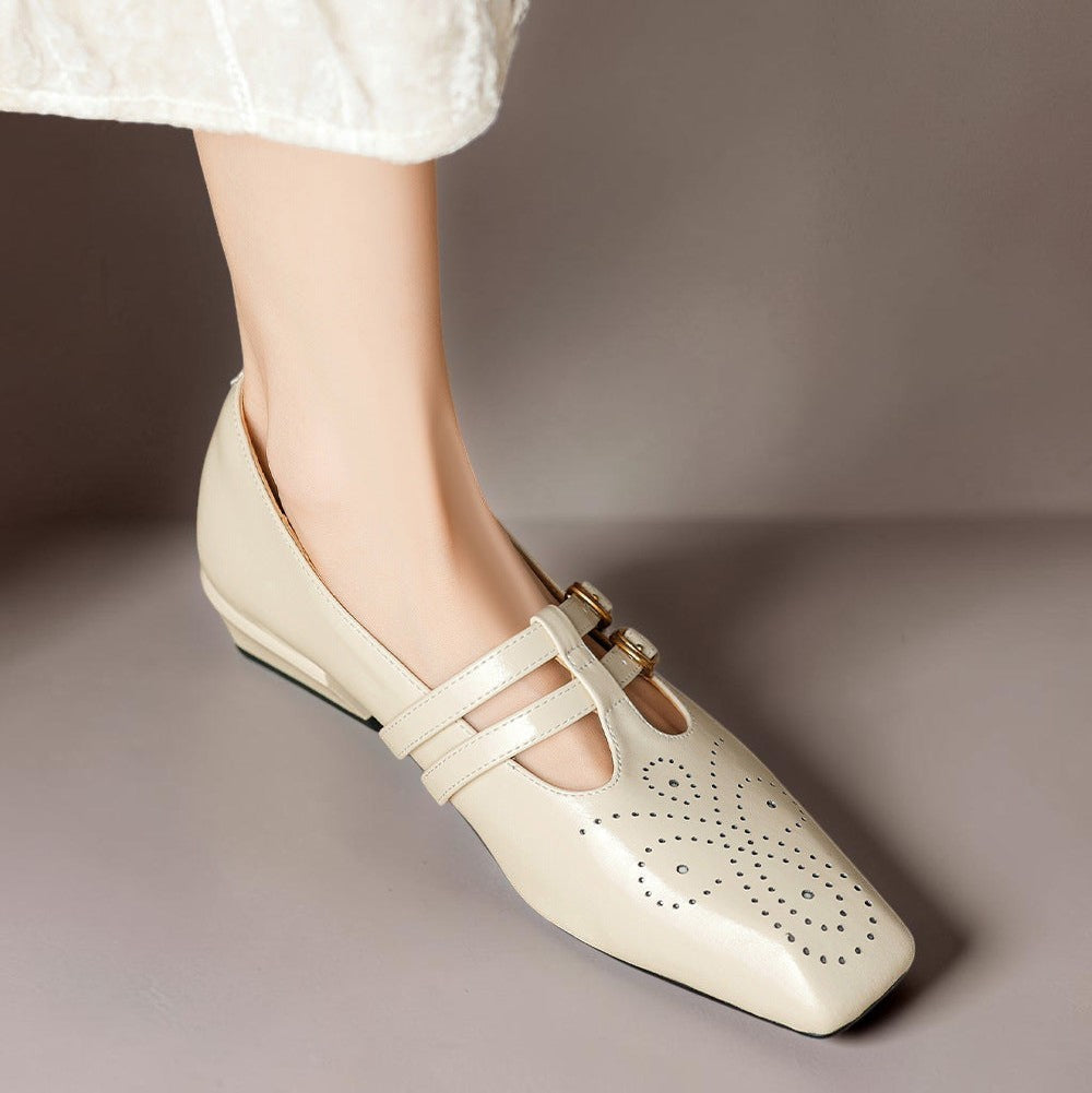 Marisol – Mary Jane-pumps med brogue-mønster og dobbelt rem