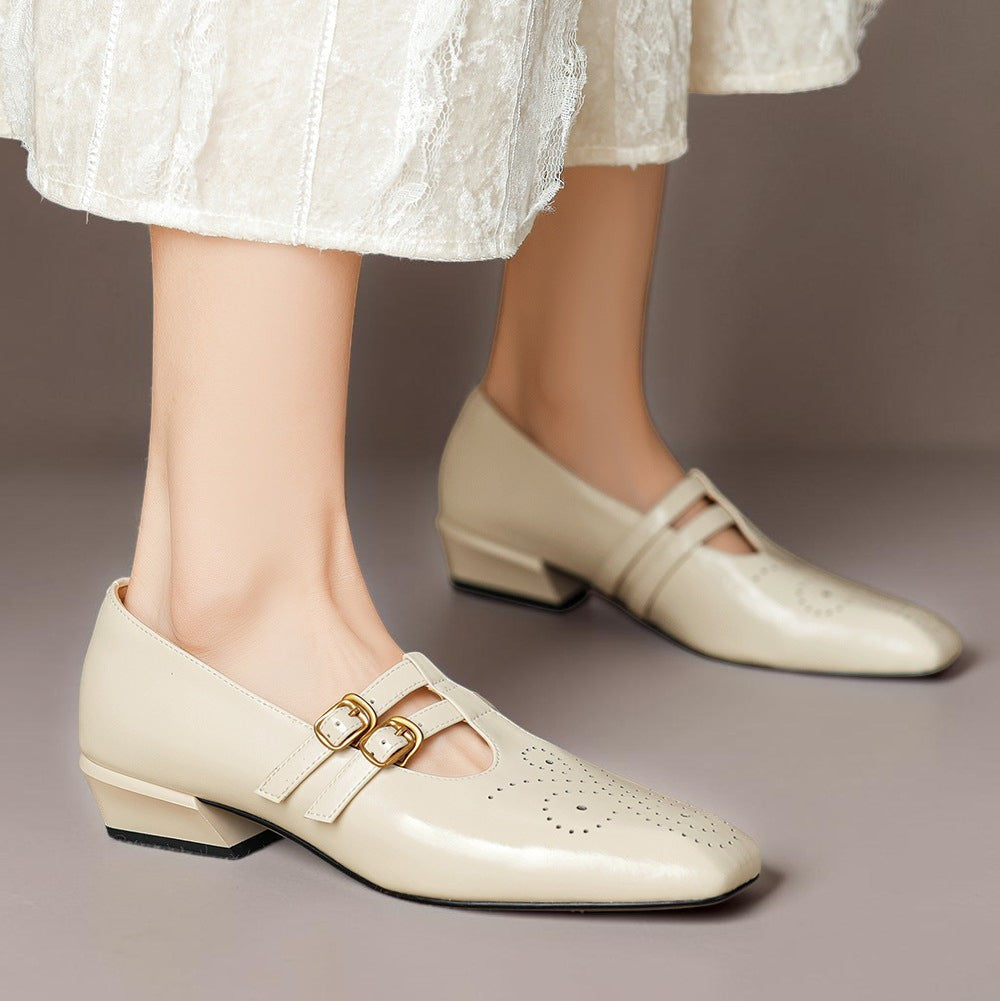 Marisol – Mary Jane-pumps med brogue-mønster og dobbelt rem