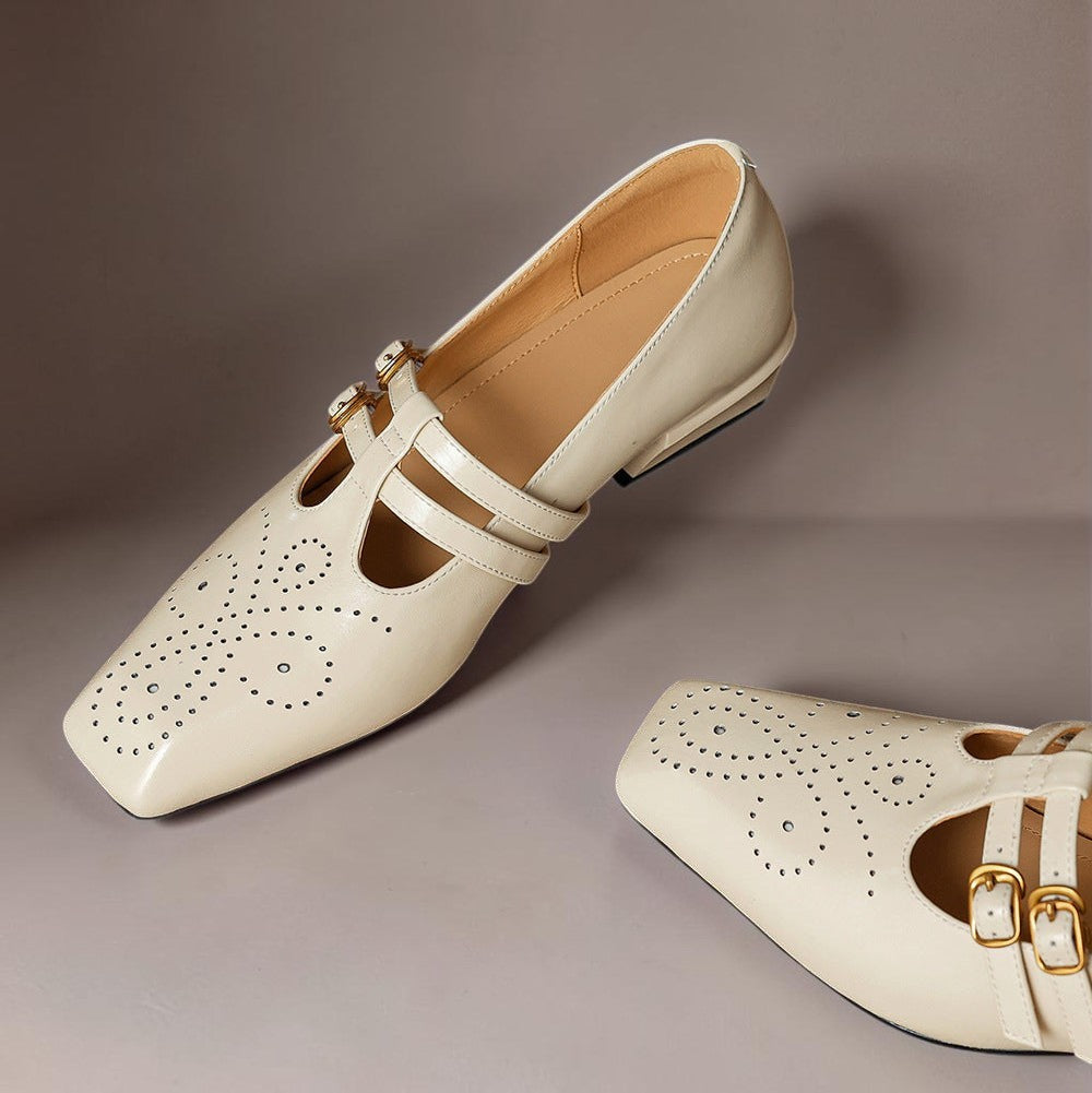 Marisol – Mary Jane-pumps med brogue-mønster og dobbelt rem