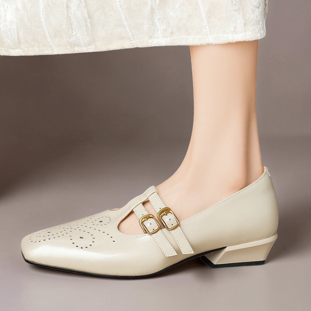 Marisol – Mary Jane-pumps med brogue-mønster og dobbelt rem