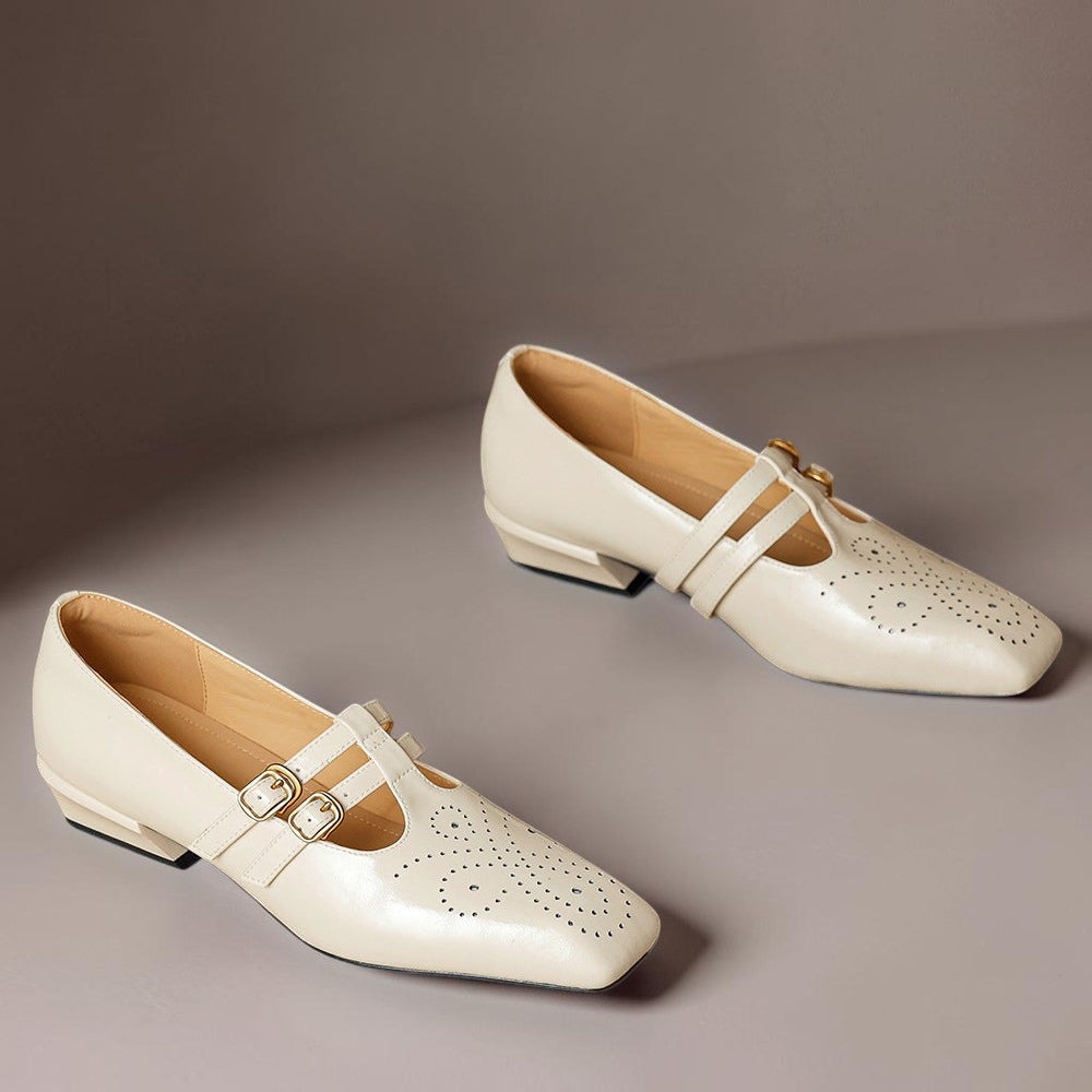 Marisol – Mary Jane-pumps med brogue-mønster og dobbelt rem