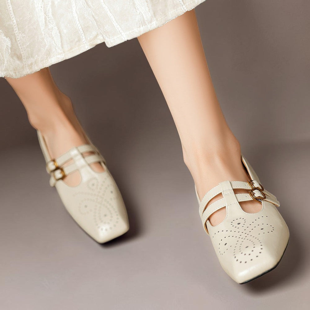 Marisol – Mary Jane-pumps med brogue-mønster og dobbelt rem