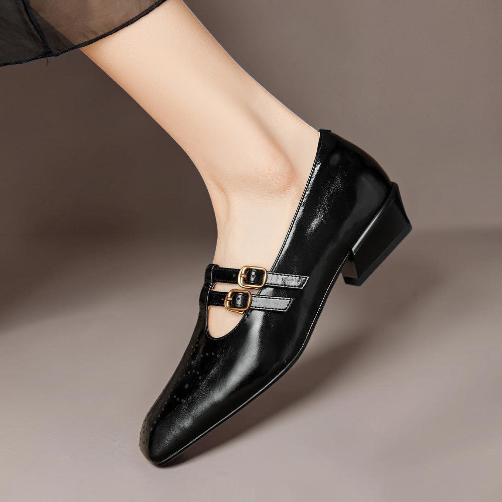 Marisol – Mary Jane-pumps med brogue-mønster og dobbelt rem