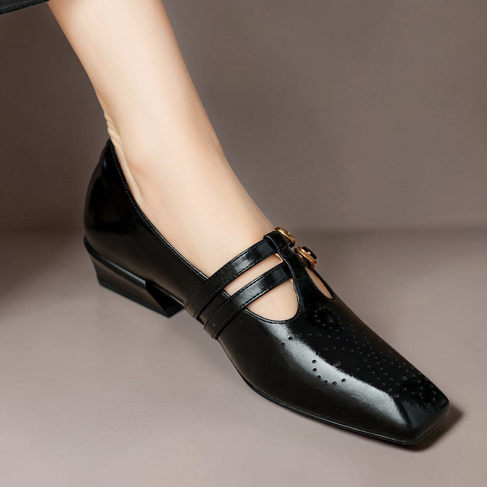 Marisol – Mary Jane-pumps med brogue-mønster og dobbelt rem