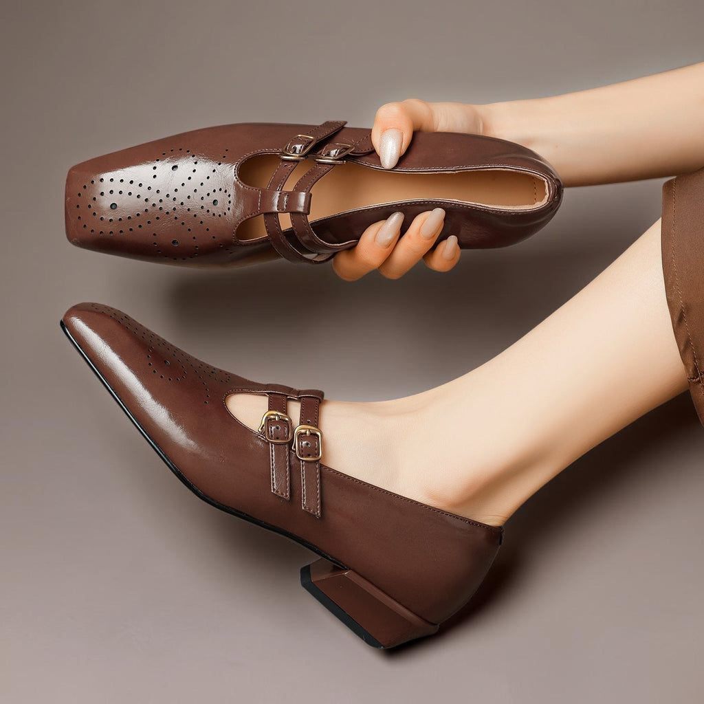 Marisol – Mary Jane-pumps med brogue-mønster og dobbelt rem