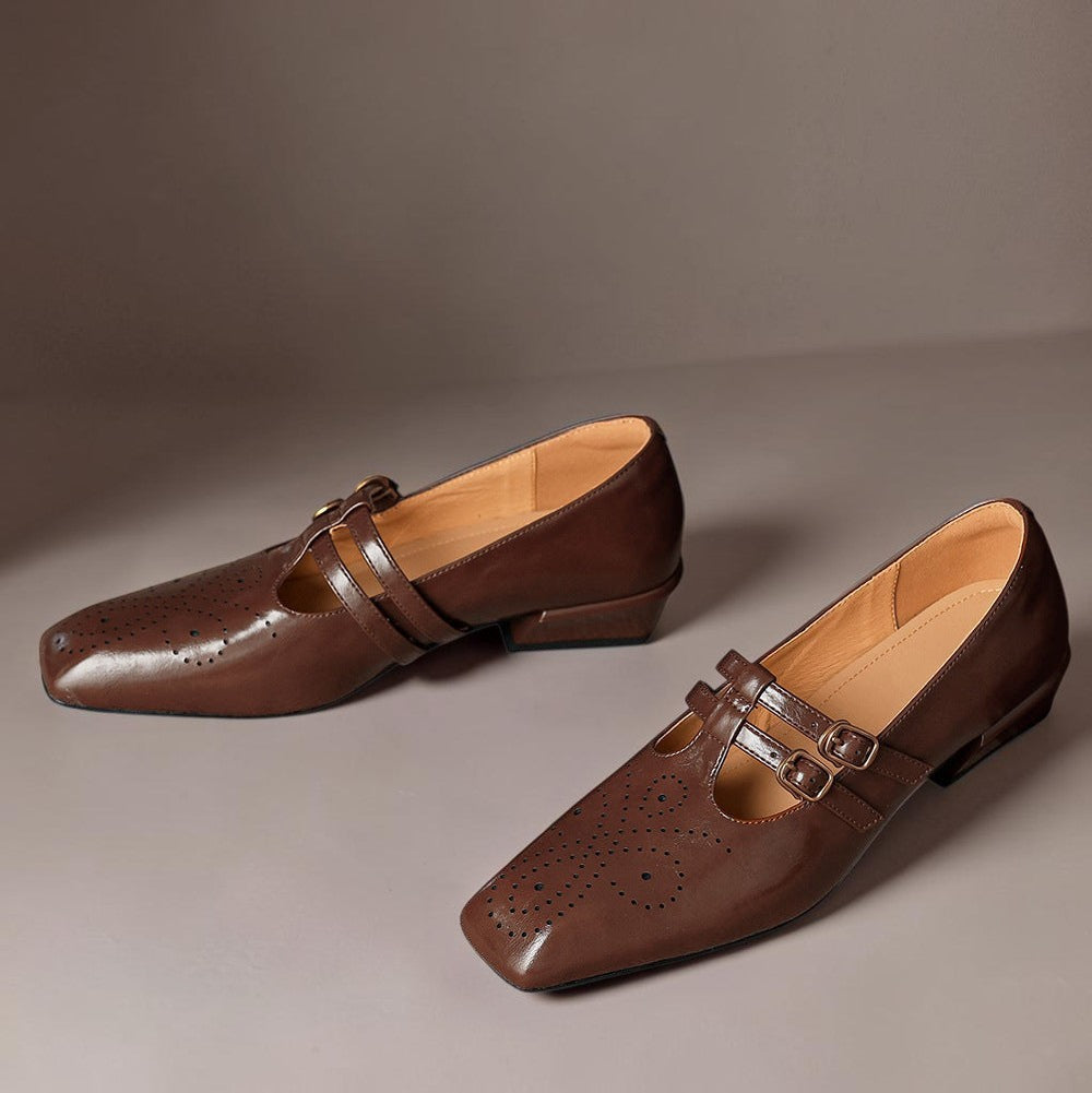 Marisol – Mary Jane-pumps med brogue-mønster og dobbelt rem