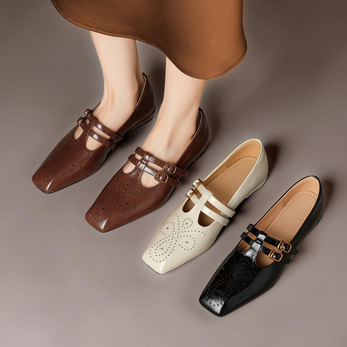 Marisol – Mary Jane-pumps med brogue-mønster og dobbelt rem